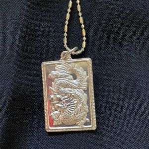 Dragon & “Grace” pendant, roughly translated in Chinese, 18” chain. Sterling